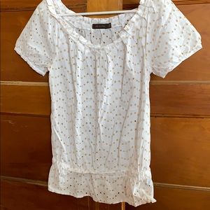 White top with cream colored eyelets.